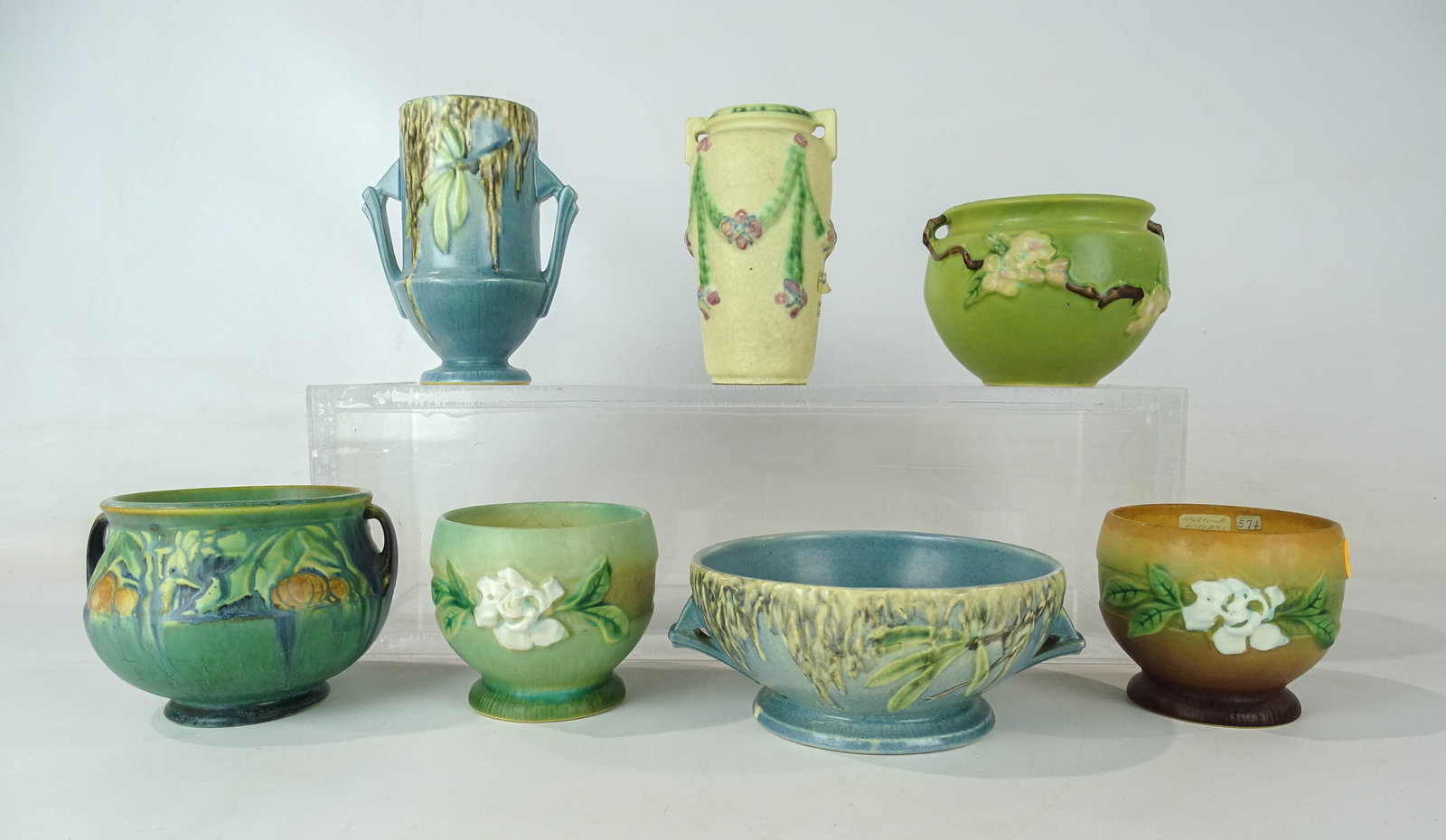 Roseville Lot: Lot (7) pieces of Roseville including (2) vases (6 1/2" Ht.), (5) planters (largest 7" D., base chip), one has interior crazing, good condition unless noted. Barbara Packer Collection.