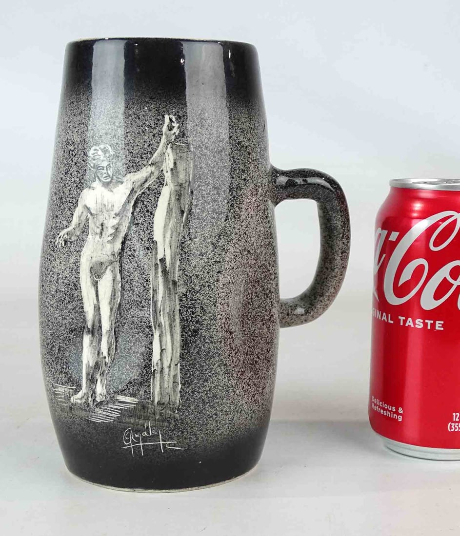 Mug with Male Figure: Artisan made shaped ceramic tankard with glaze painted male nude figure. Signed indistinctly by artist.. 7 1/2" Ht..