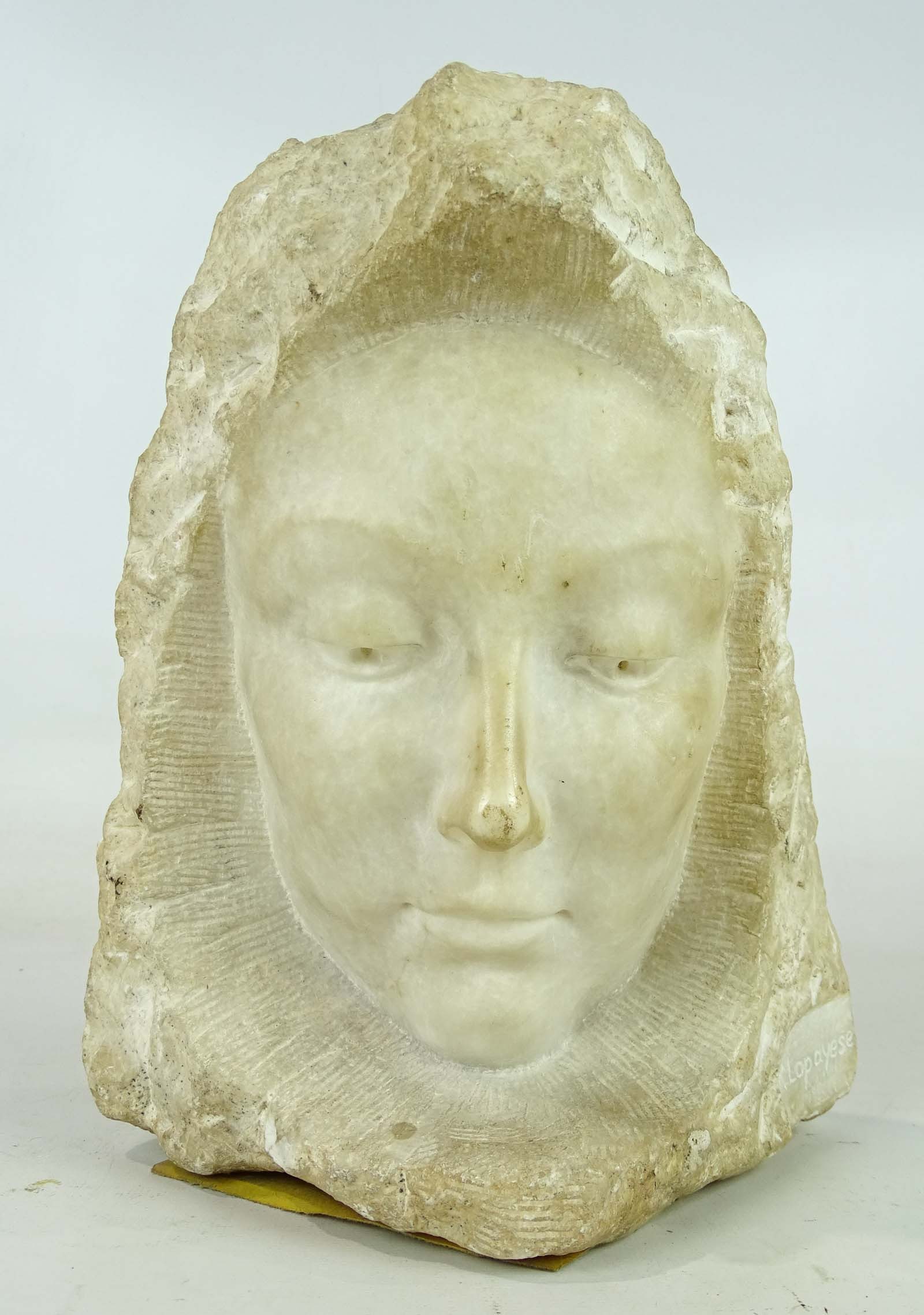 Carved Marble Face: Carved marble face. 10 1/2" Ht..