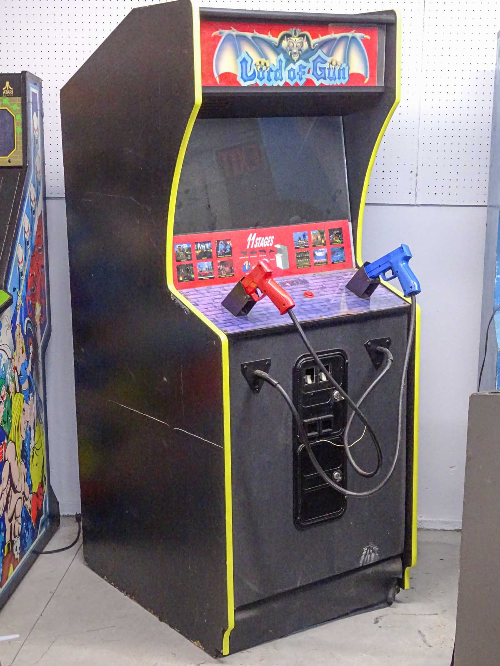Vintage Arcade Game: Lord of Gun: Light gun shooting game with lots of flashing effects released by Taiwan's IGS. Needs plug in power cord. Not tested.