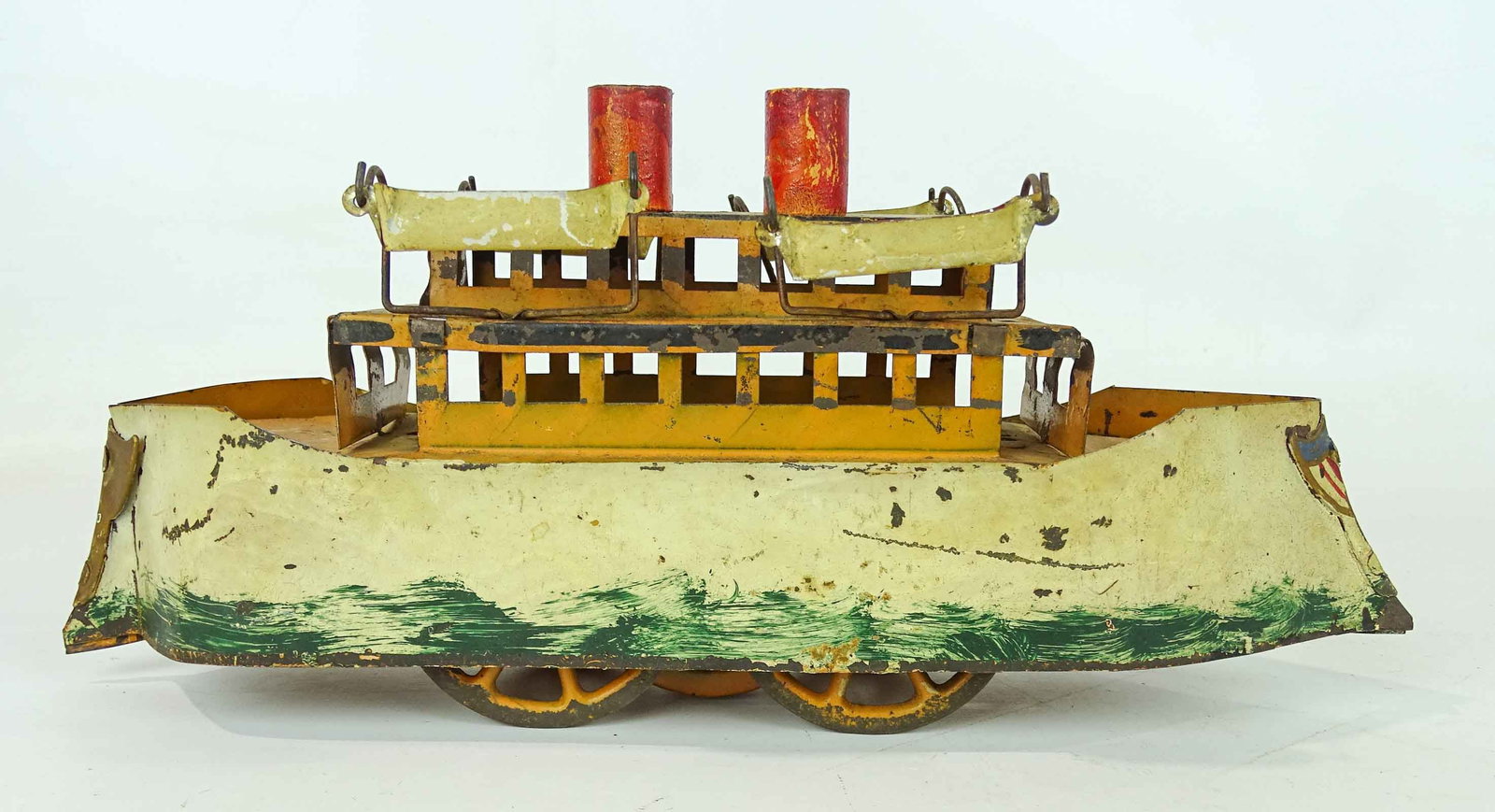 Schible Spanish American Toy Boat: C. 1900 Schible Spanish American War boat toy. Complete with life boats. 12" L., 5" Ht..