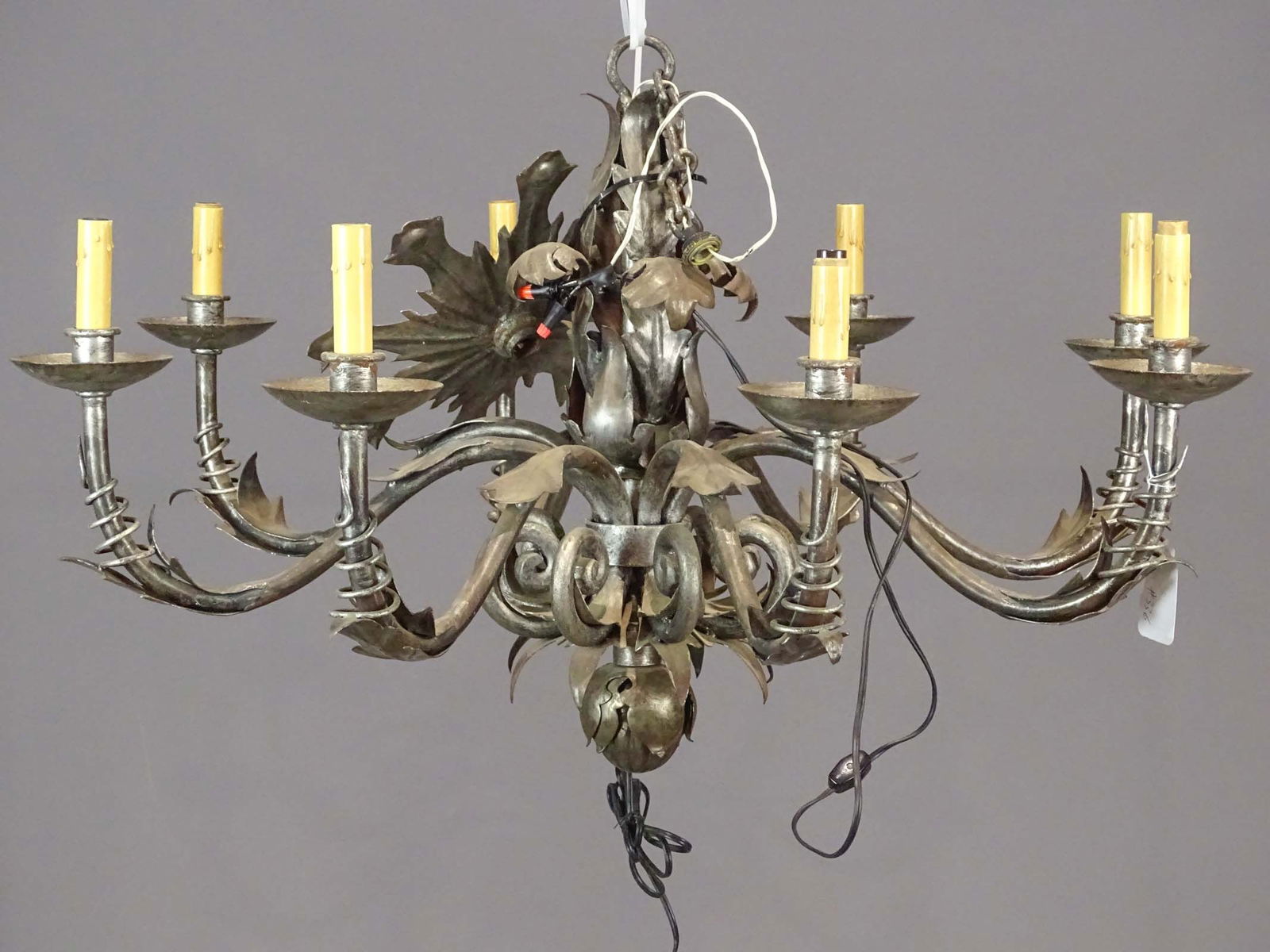 Wrought Iron Chandelier: Wrought iron leaf motif chandelier. 34" D., 21" Ht..