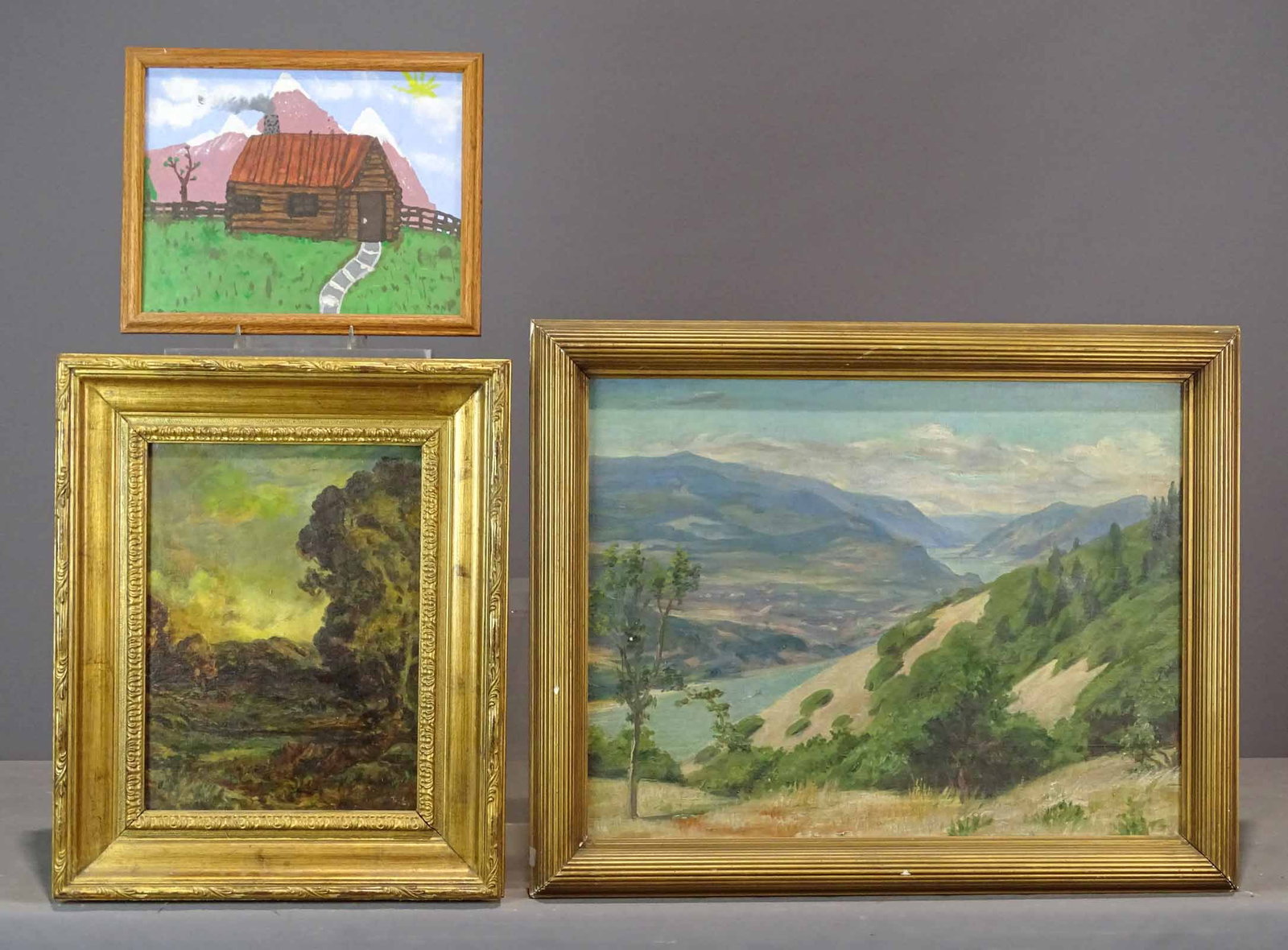 Artwork Lot: Artwork lot including: Landscape, oil on canvas (overall 24" x 30"), oil on panel landscape (overall 23" x 18 1/2"), landscape with cabin (overall 12" x 15").