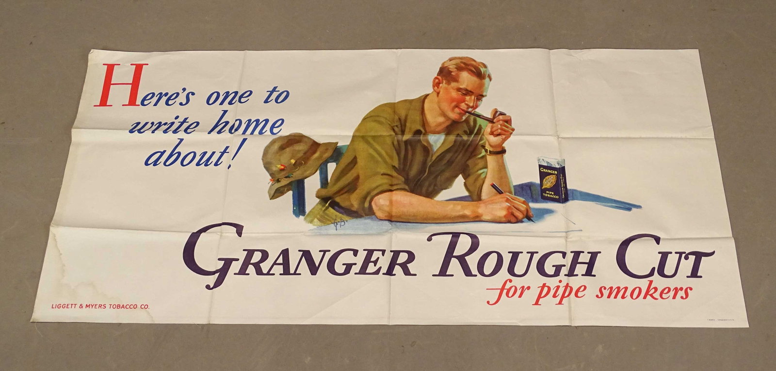 Early Advertising Banner: Early advertising banner "Here's one to write home about! Granger Rough Cut for pipe smokers" (Liggett & Myers Tobacco Co.). Folded as issued. 29 1/2" x 62".