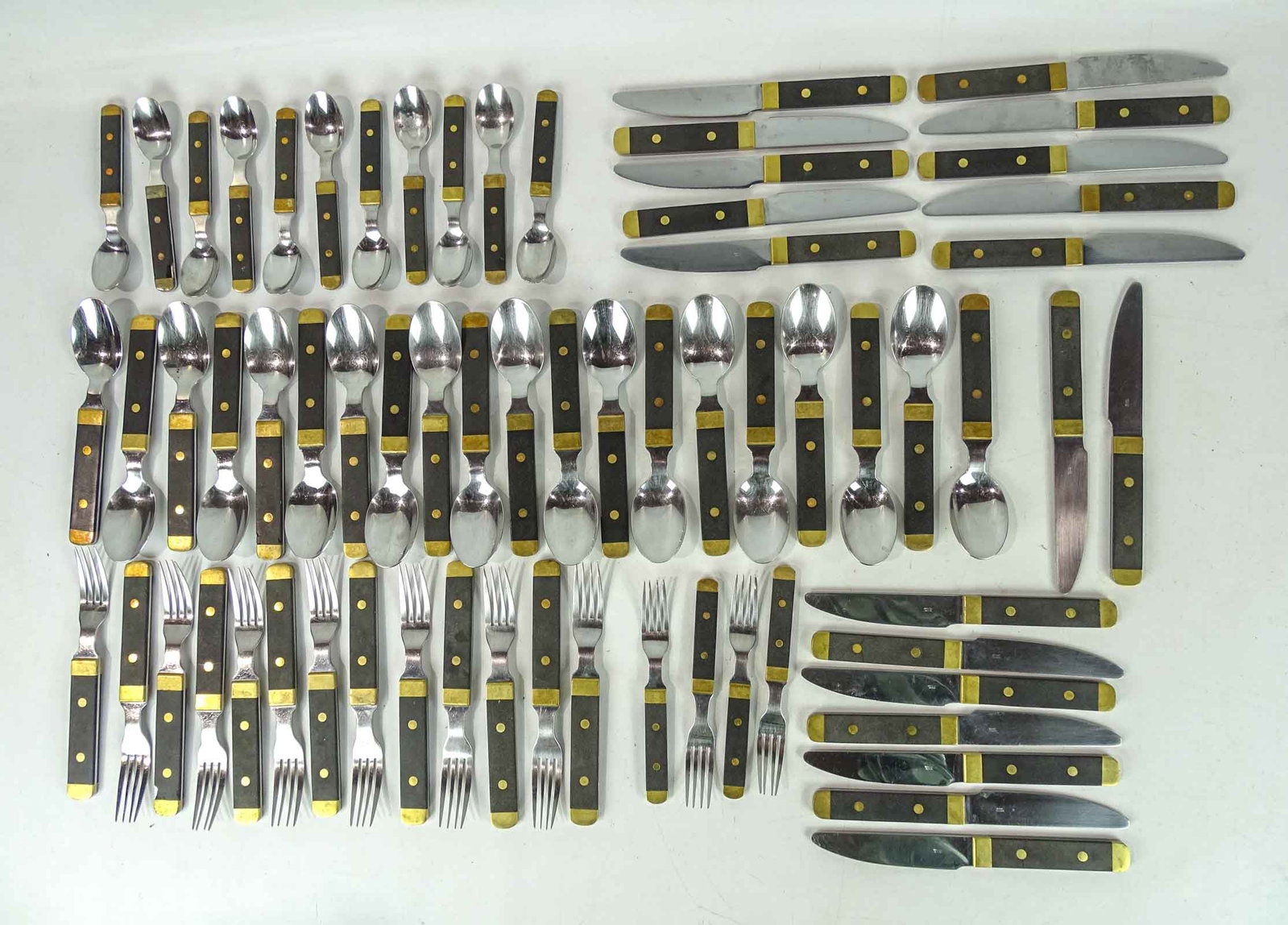 Mikasa Flatwear: Mikasa flatwear. Includes (19) knives, (6) salad forks, (11) forks, (20) large spoons and (11) small spoons.
