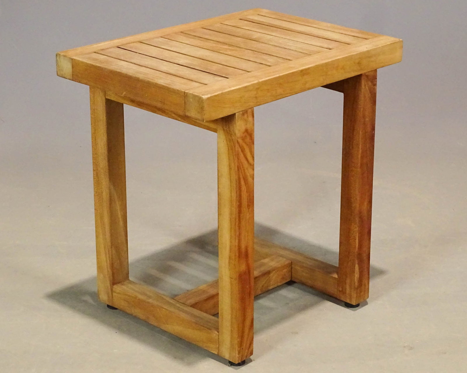 Teak Side Table: Teak side table. Labeled "Aqua Teak". 18" x 13" x 18 1/2".