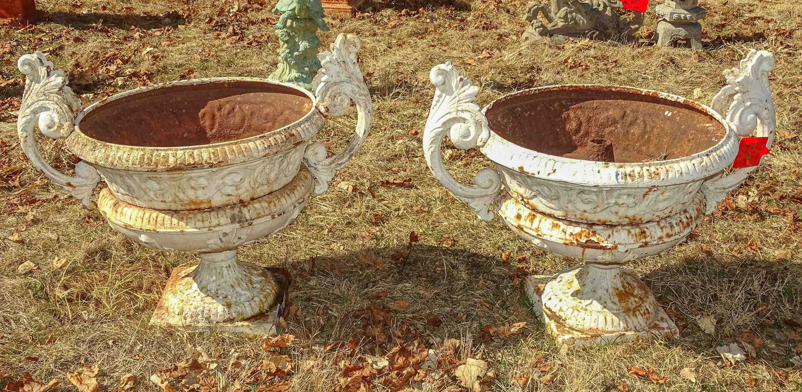 Cast Iron Urns: Pair of urns. 20" ht, 20" diameter..
