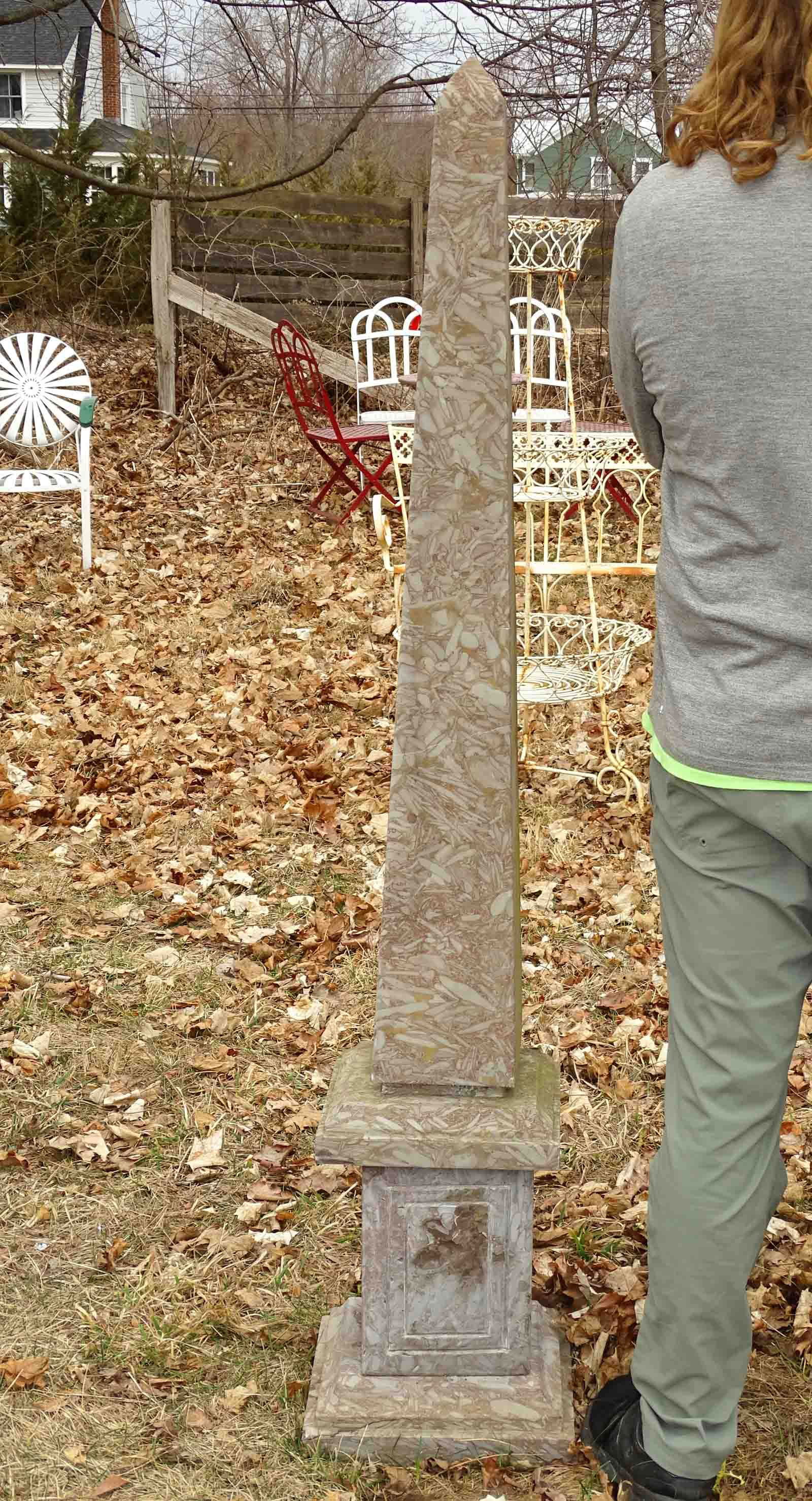 Stone Obelisk: Cultured stone obelisk, 3 pieces. 64" ht..