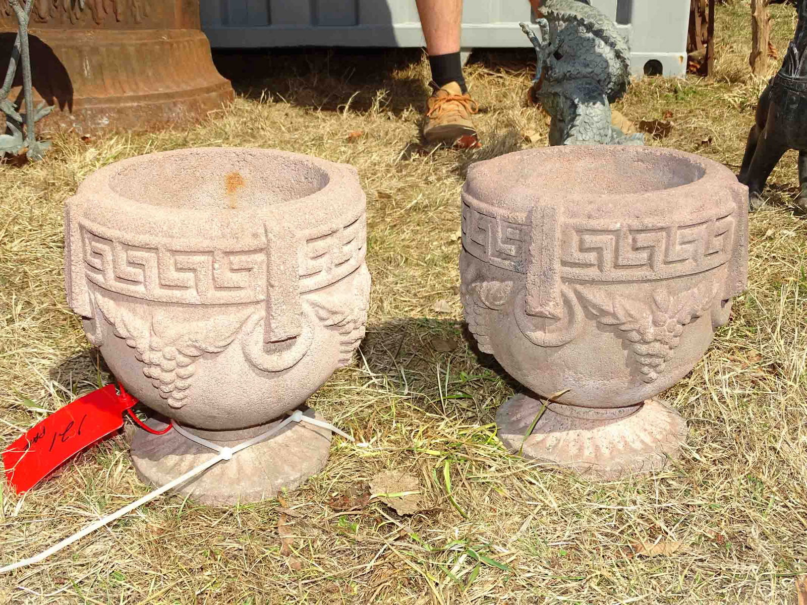 Urns: Pair of Grecian urns. 9" ht, 8" diameter.