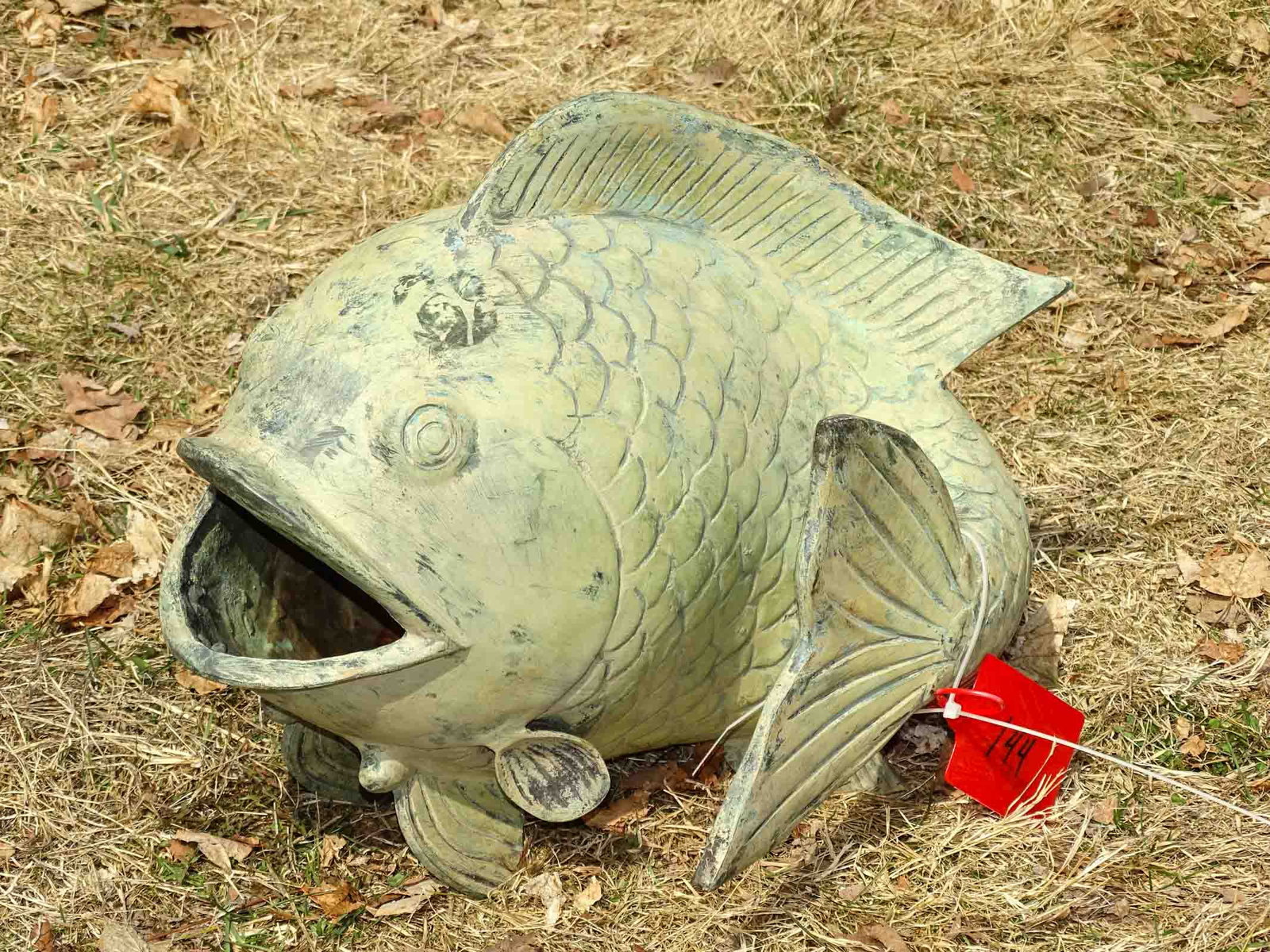 Fountain: Bronze fish fountain. 14" ht, 19" w..