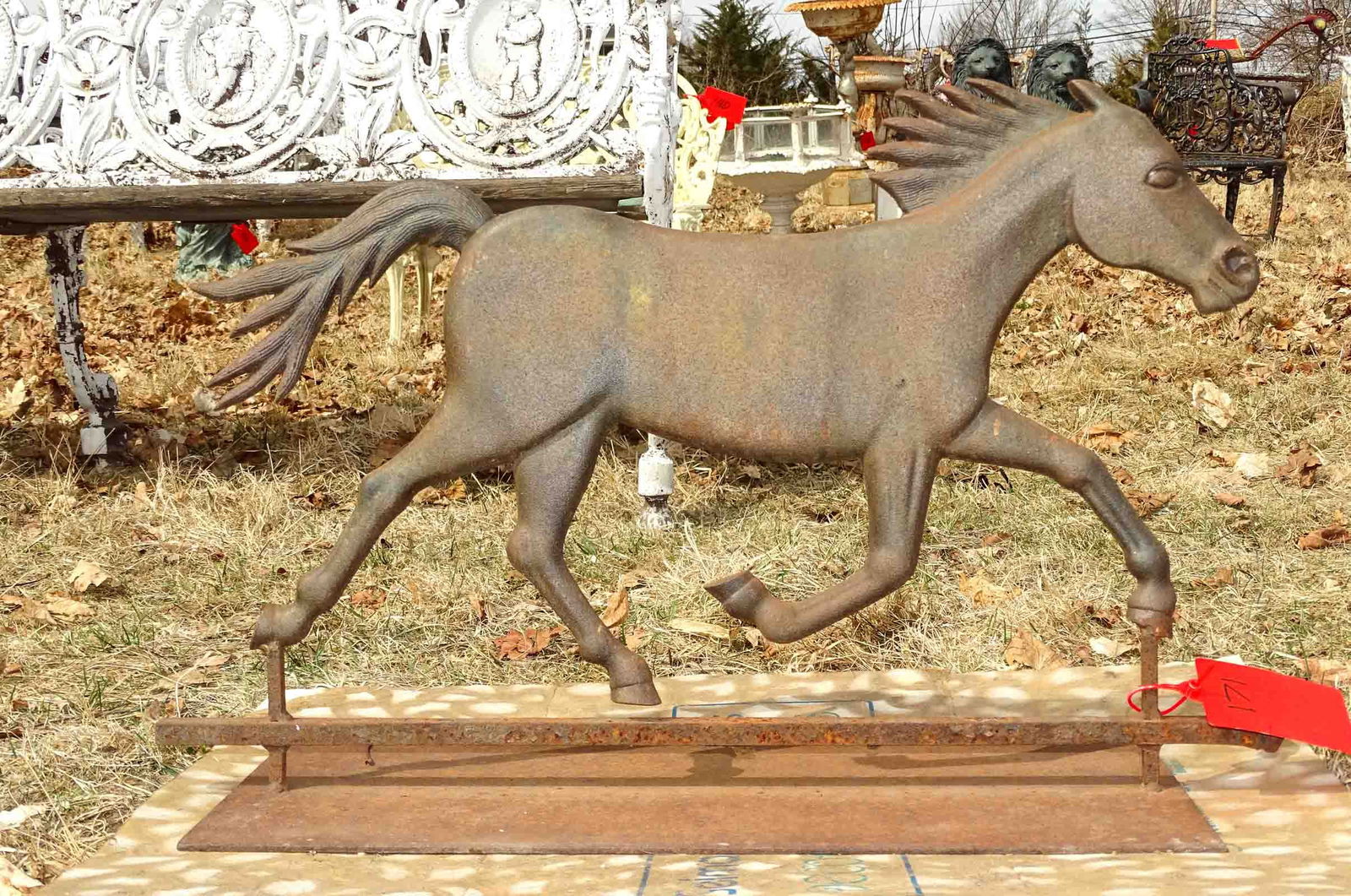 Cast Iron Horse: Cast iron horse on base. 19" ht, 28" w..