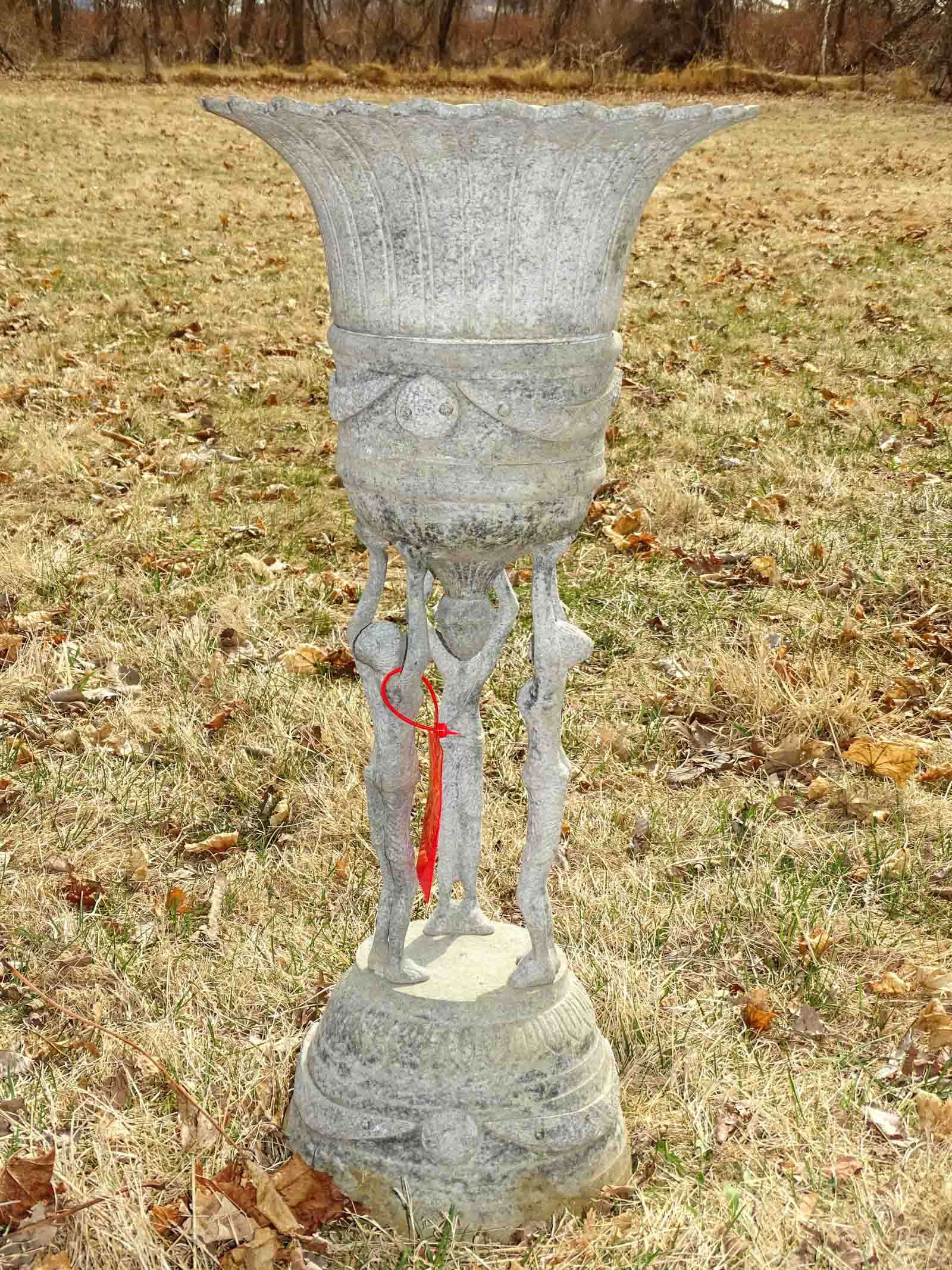 Urn: Cast aluminum 2-piece figural plant urn. 29" ht, 19" diameter.