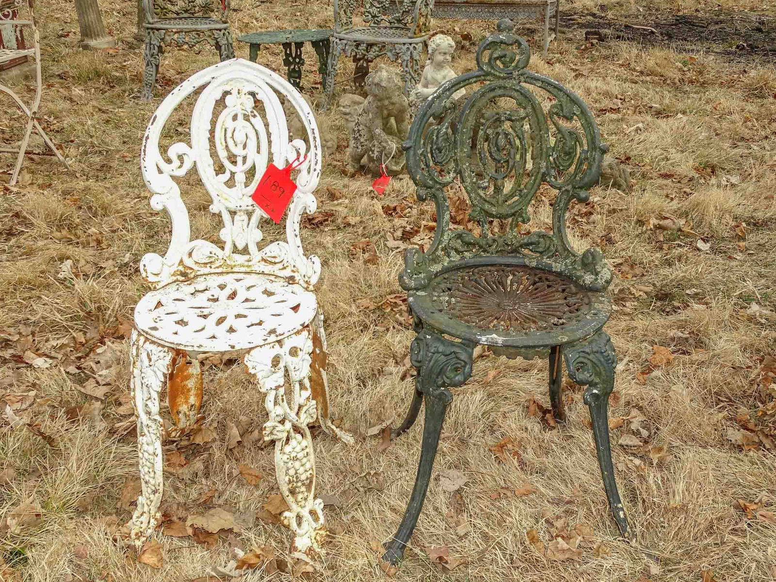 Lawn Chairs: Pair of cast iron Victorian lawn chairs.