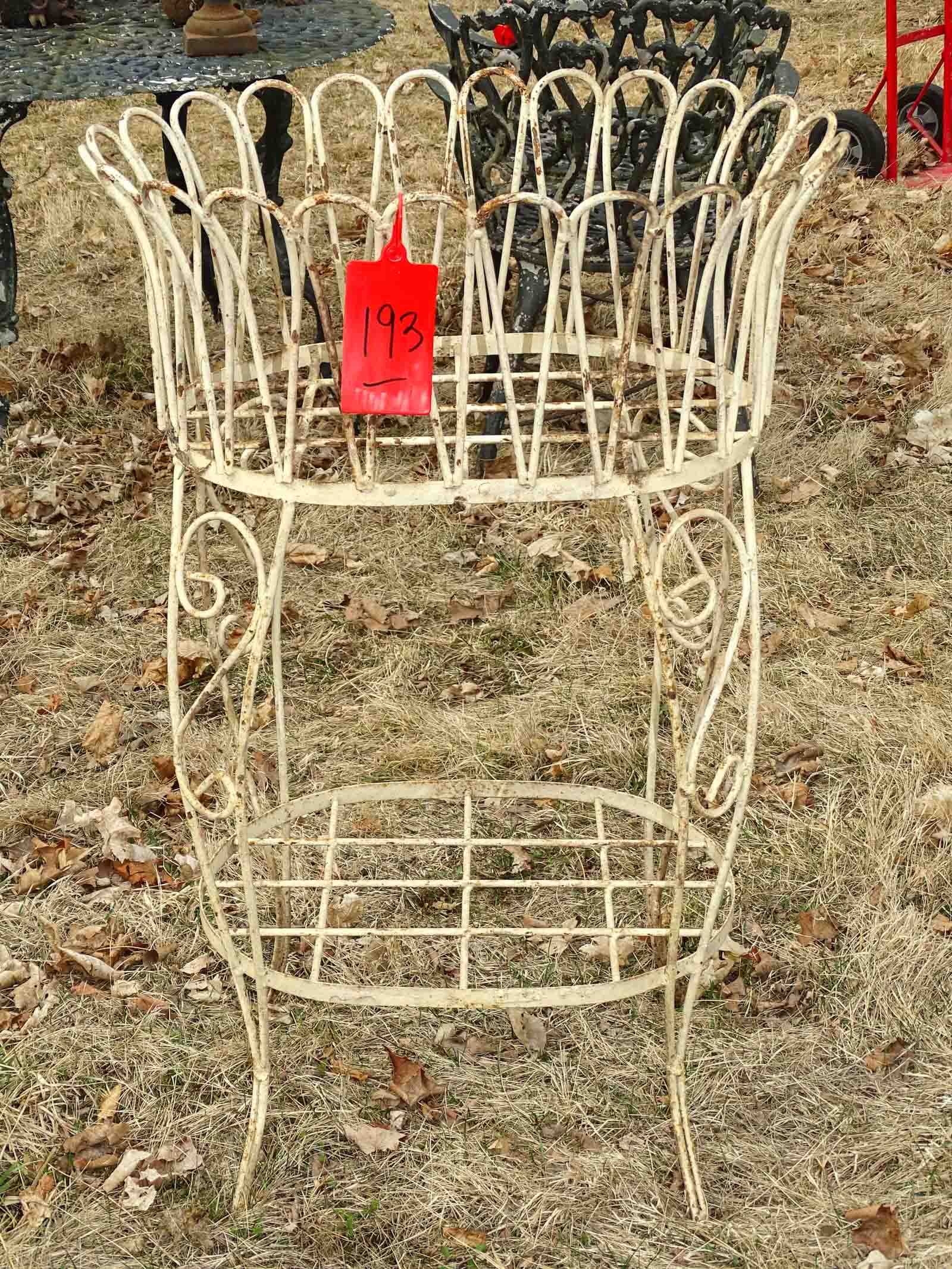Planter: Wrought iron planter. 36" ht..