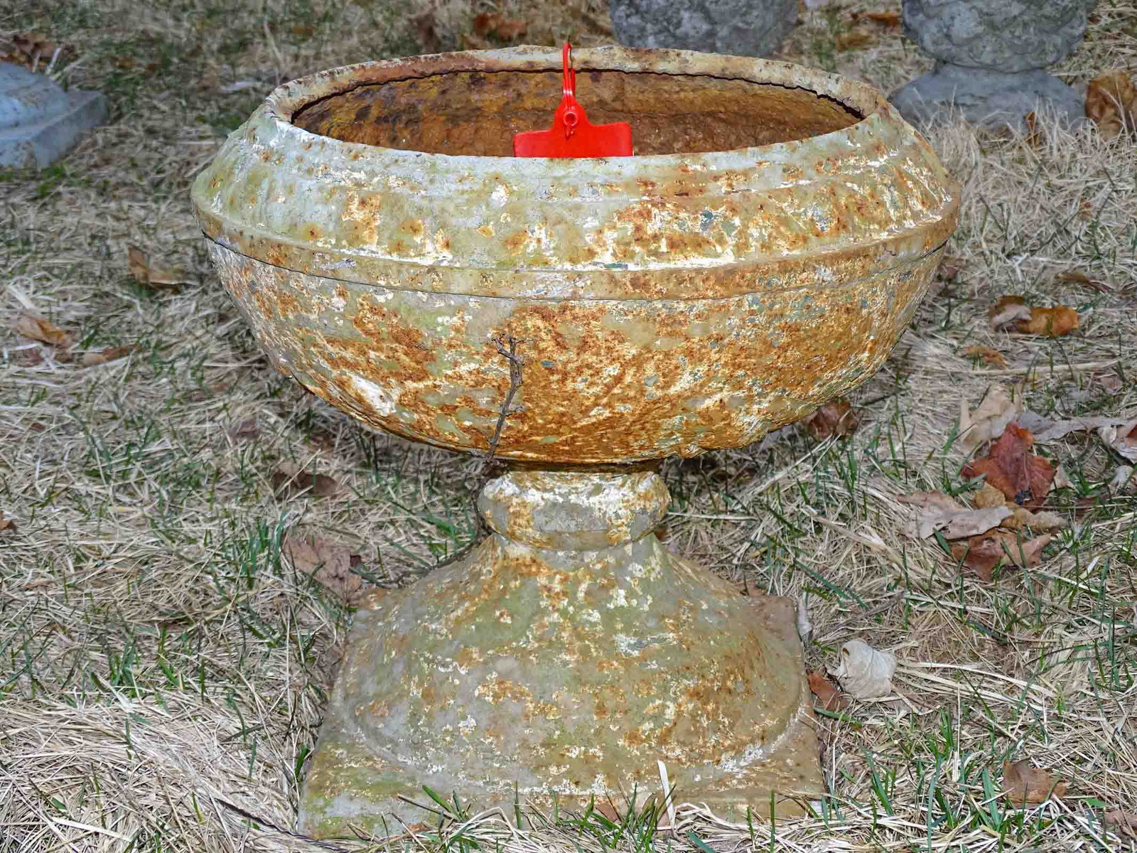 Stone Planter: Cast iron planter. 15" ht, 15" diameter.