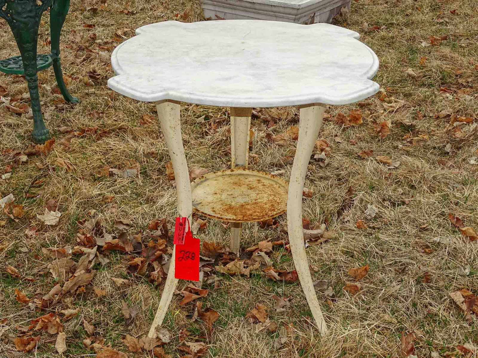 Marble Top Table: Metal base marble top table. 28" ht, 27" diameter.