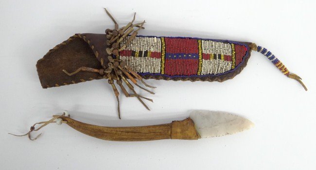 Native American Knife: Native American bone handle knife with stone (?) blade. In beaded case. Knife 11" Length.