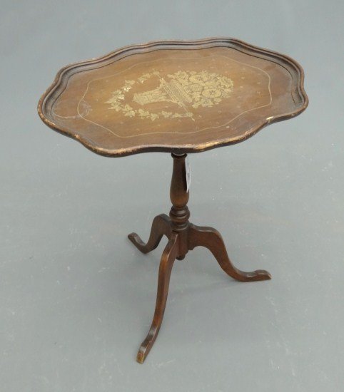 Table: Contemporary tilt top table.