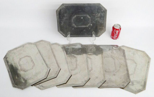 Silverplate Mats: Set of eight silverplate made in Portugal place mats. Ex: Guennol Collection.