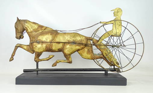 Horse and Sulky Weathervane: Horse and sulky weathervane with unsual sheet form driver. All in identical furface. Wooden base included. 36" x 6" x 18 1/2" Ht..