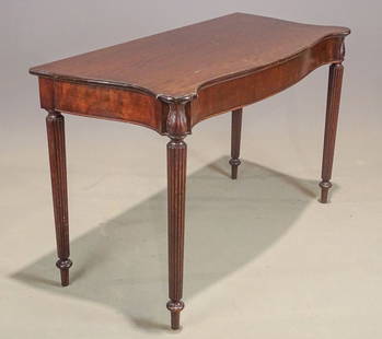 19th c. Sheraton Console Table: 19th c. Sheraton mahogany console table having tapered reeded legs with foliate capitals. 48" x 21 1/2" D., 30 1/2" Ht.. Provenance: Buckley and Buckley Collection. Ct..