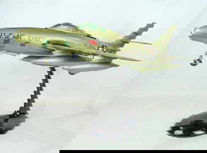 Airplane Model: Airplane Model 25" x 18" x 10". Copy of F84 Thunderstreak. Custom metal base (12" Ht.).