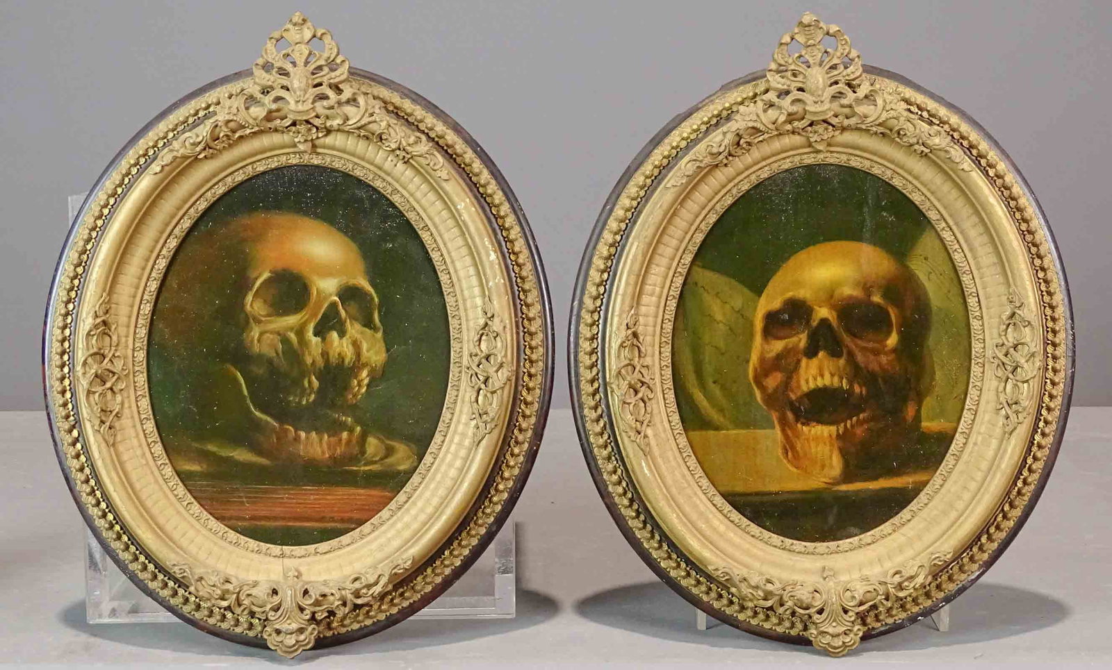 Pair Skull Paintings: Pair of skull paintings on panels. Sight 9 1/2" x 7", overall 16" x 12".