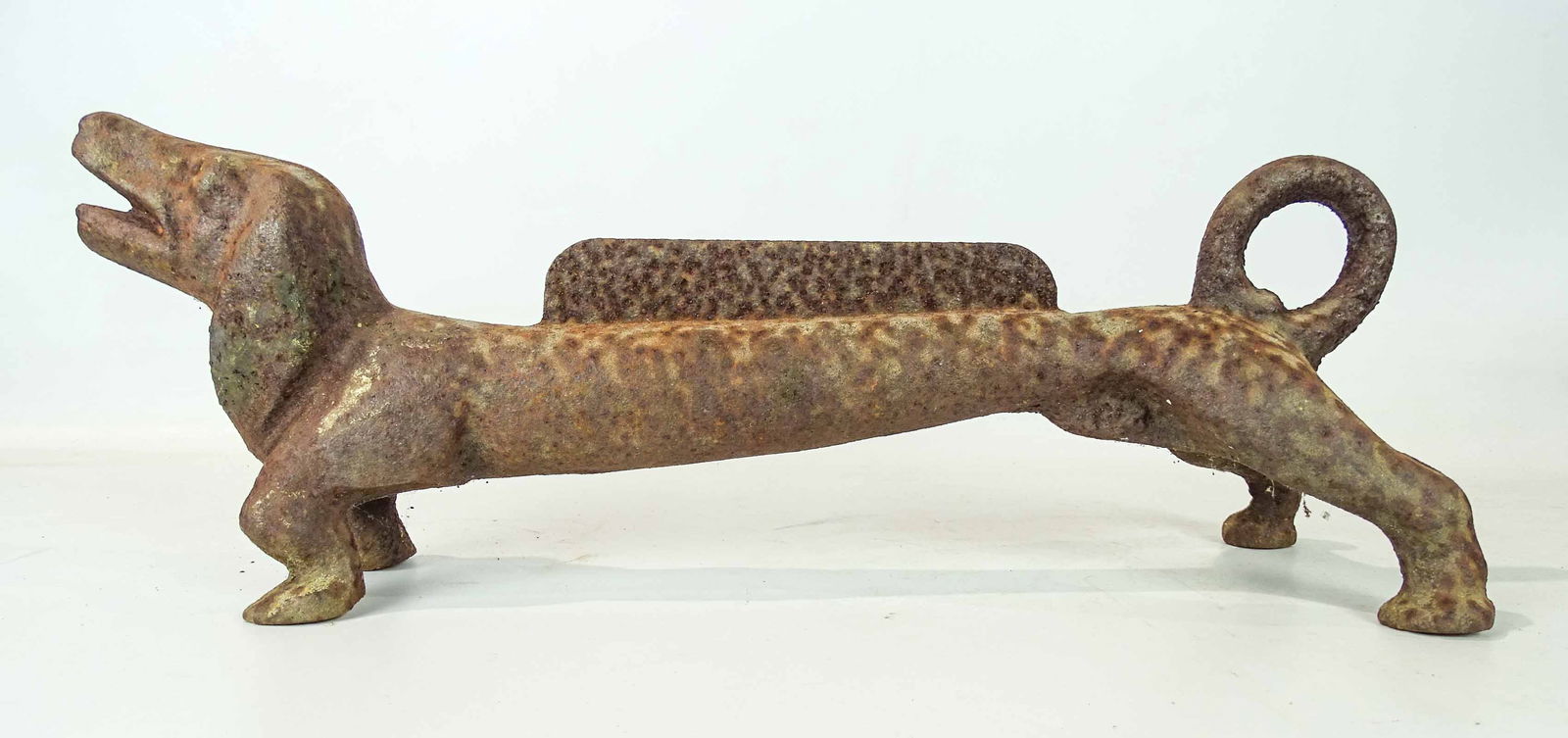 Daschund Bootscraper: Cast iron Daschund bootscraper. 21" L..