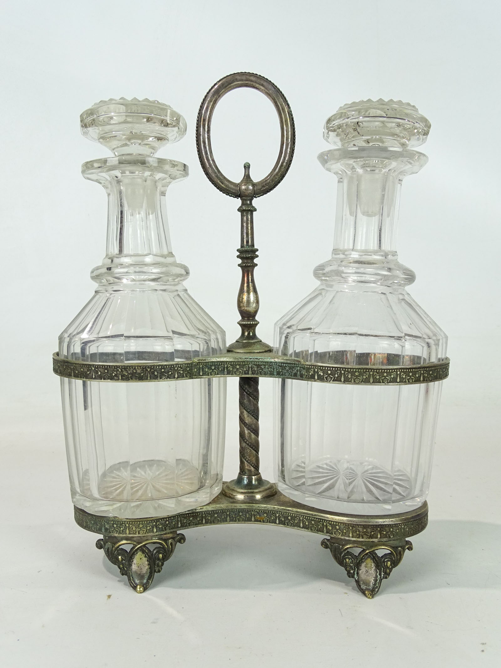 Decanters on Silverplate Stand: C. 1900 decanters on silverplate stand.