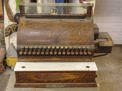 Vintage Cash Register: Vintage cash register. 19 1/2" x 16" x 17". Metal faux oak, iron and marble. As is.