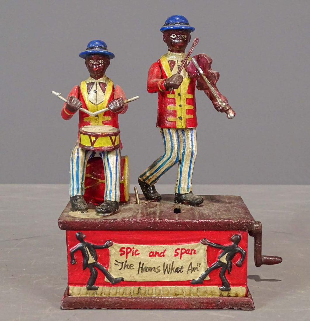 Spic and Span Mechanical Musical Bank: Spic and Span cast iron mechanical and musical bank. 7 1/4" Ht.. Sheppards Hardware.