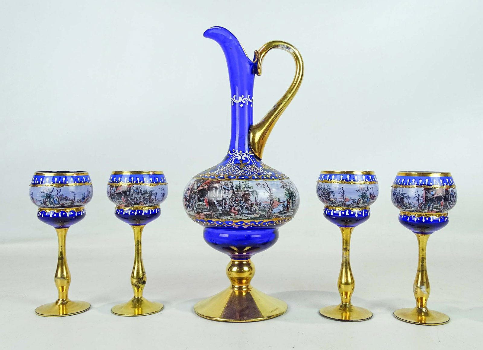Bohemian Glass Wine Set: Bohemian glass wine set including 14" pitcher with (4) stemware wines.