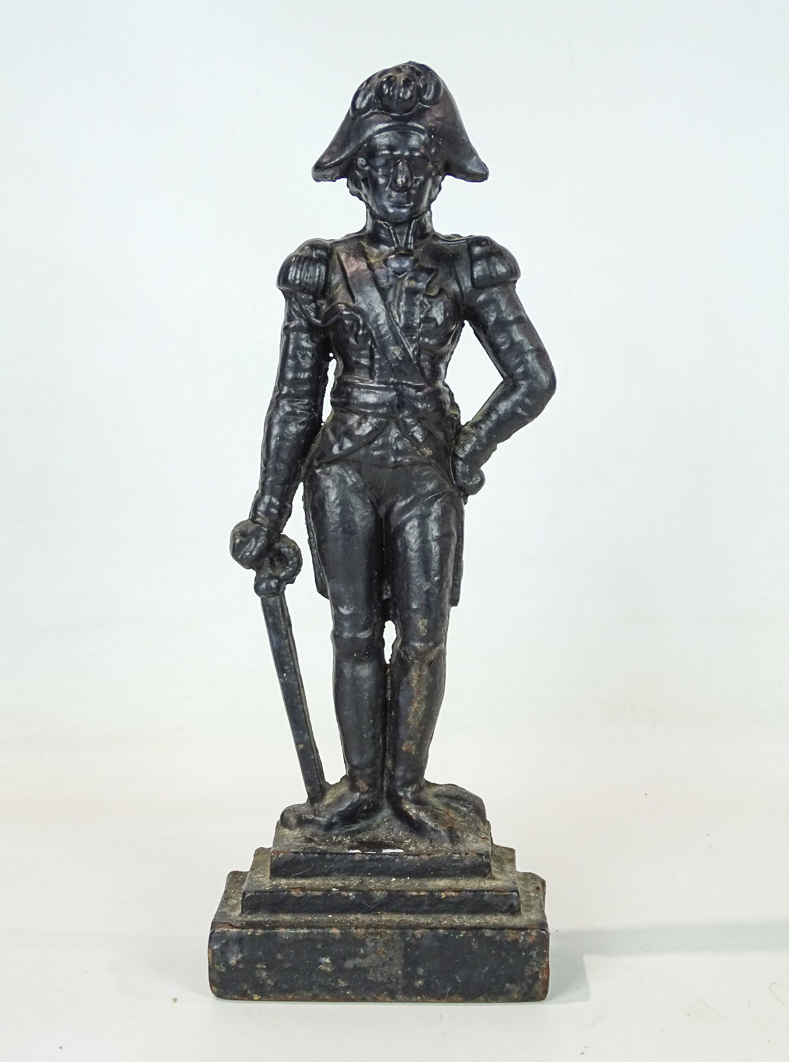 Cast Iron Doorstop: Cast iron Napoleon doorstop. 17" Ht..