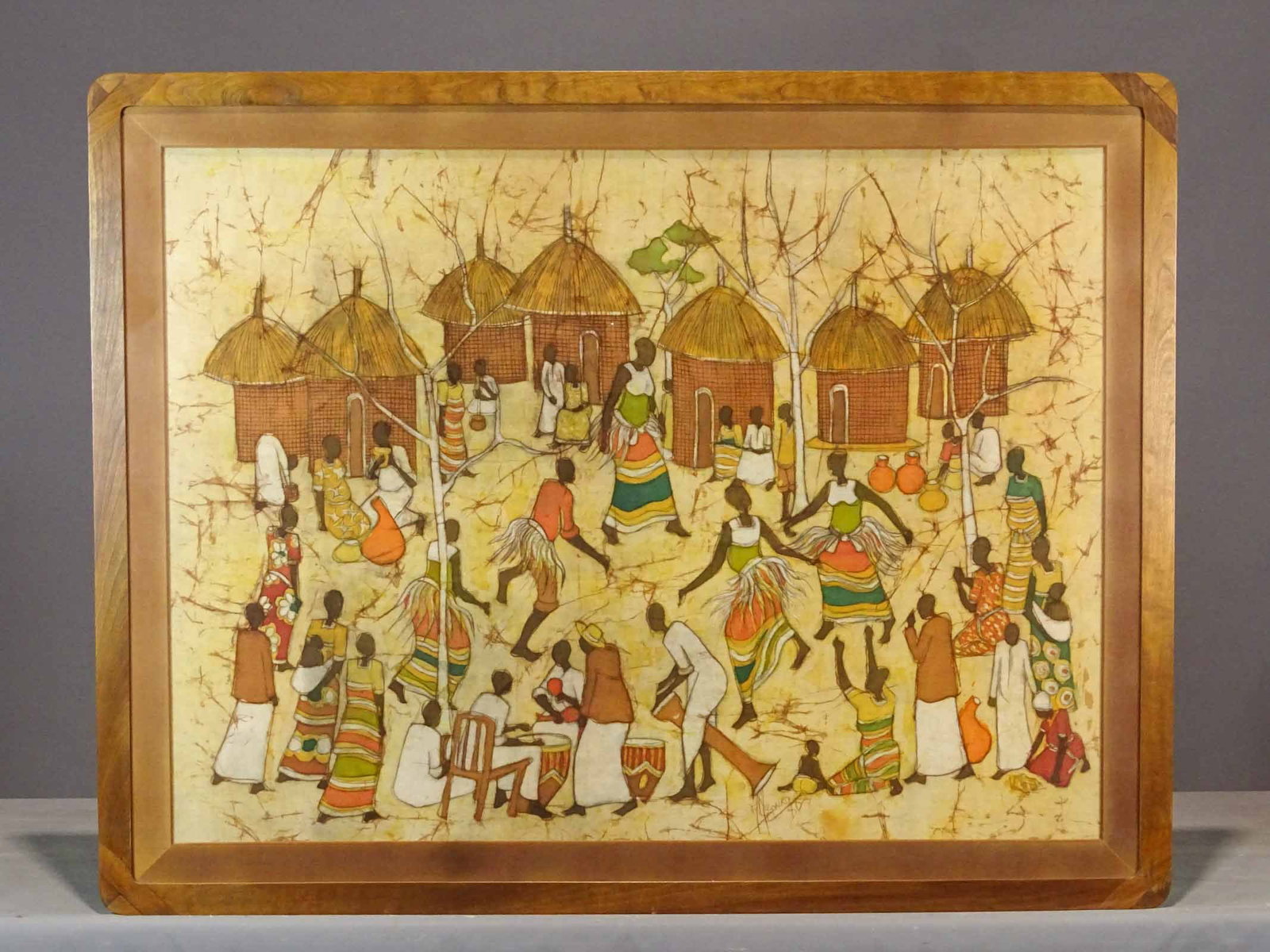 African Textile Painting: African textile painting. Village Dancers. Frame 38 1/2" x 49 1/2". Note high quality frame.