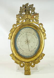 Early Continental Barometer: Early Continental gilded wooden Barometer. 34" x 19".