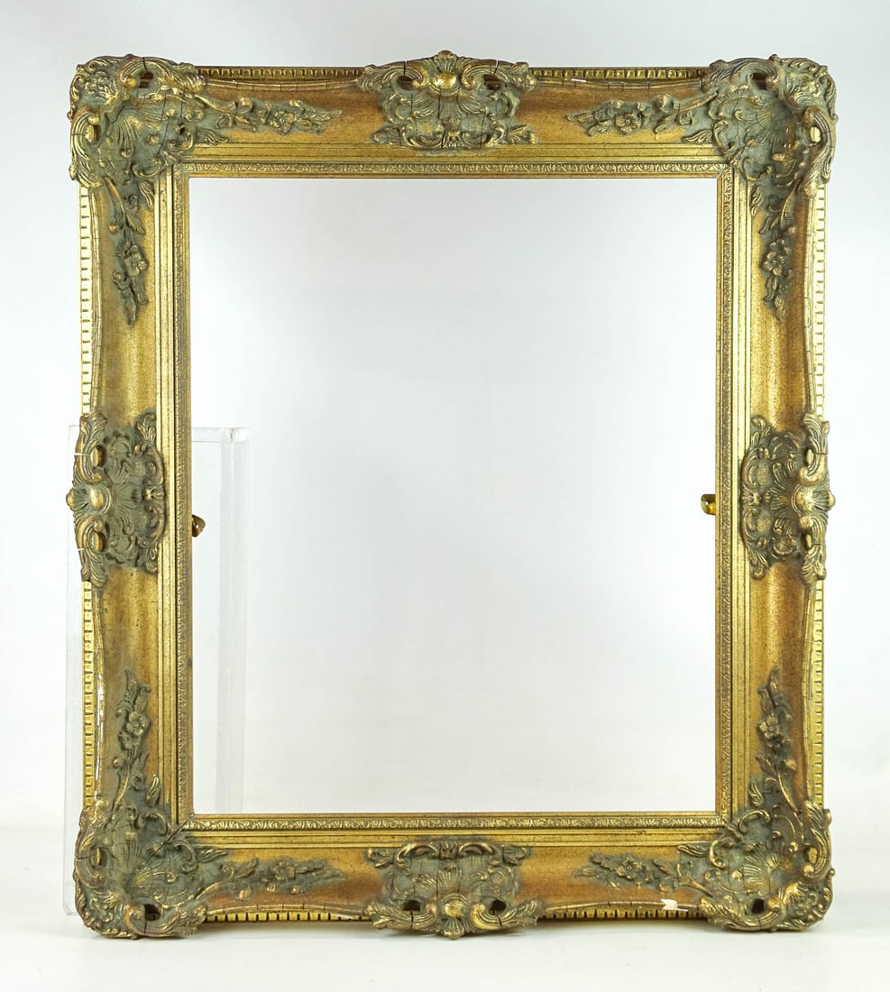 Frame: Carved wood and gesso frame. Rabbet size 24" x 20", overall 31" x 27".
