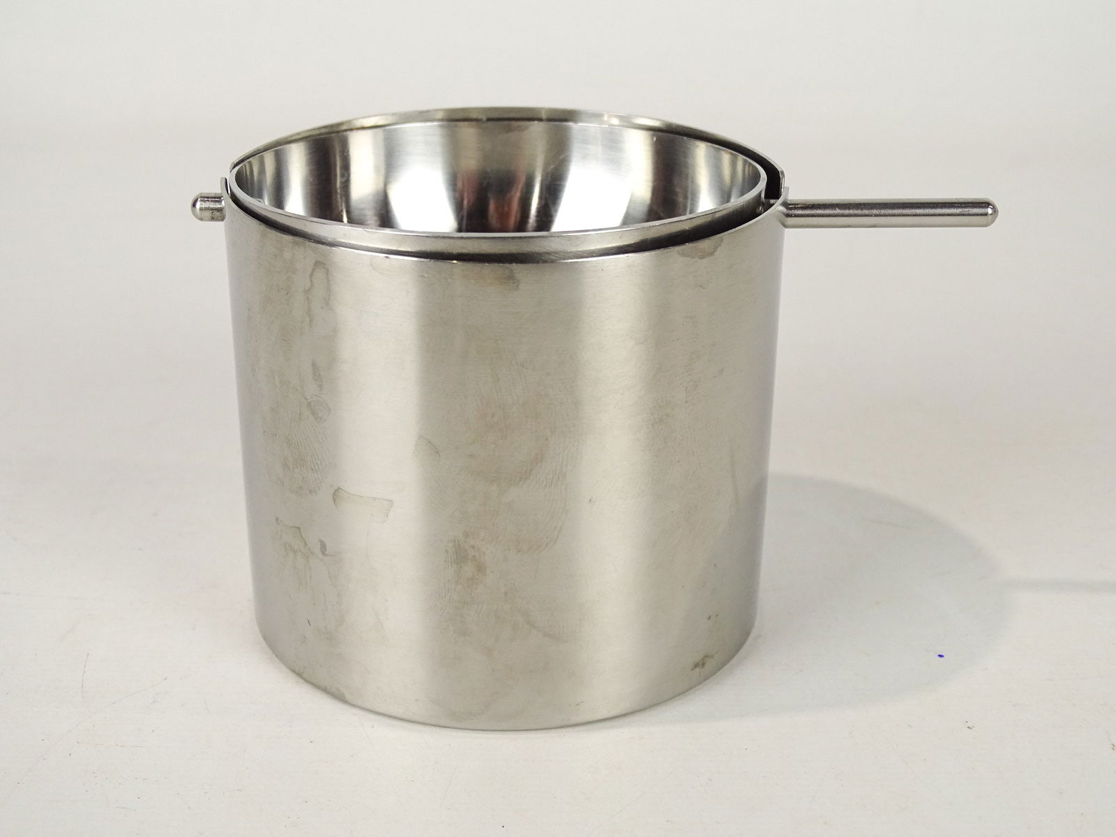Arne Jacobsen Cylinder Ashtray: Arne Jacobsen cylinder revolving ashtray. 1964. Signed Stellton Denmark. 3 1/2" D., 3" Ht..