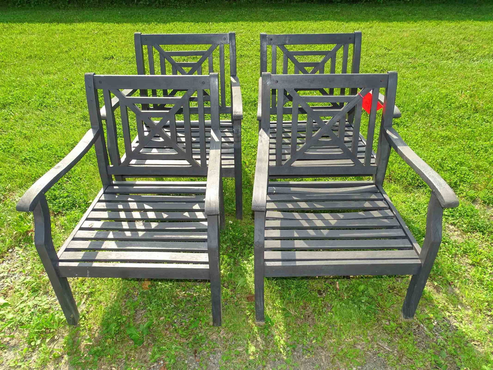 Set of Wooden Chairs: Set of (4) black wooden chairs. Geometric design. 14" seat Ht..