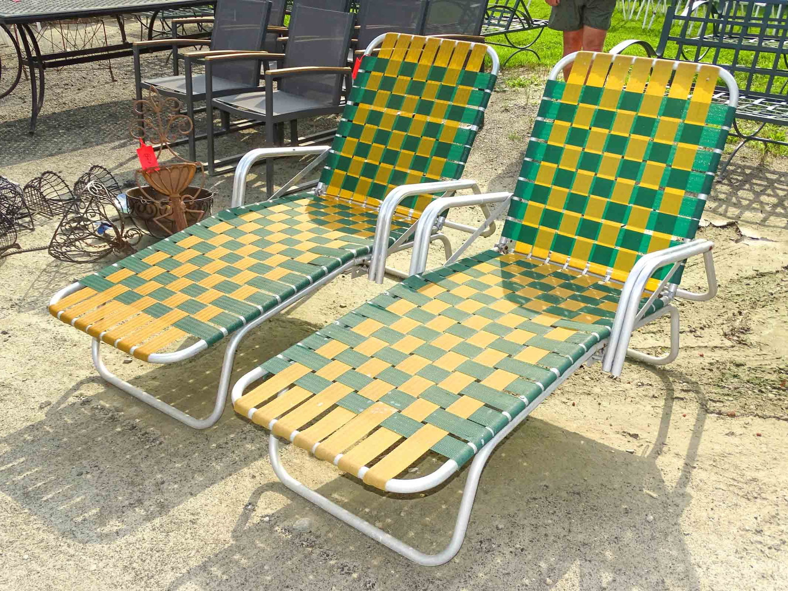 Pair C. 1940's Aluminum Webbed Chairs: Pair C. 1940's aluminum webbed lounge chairs.