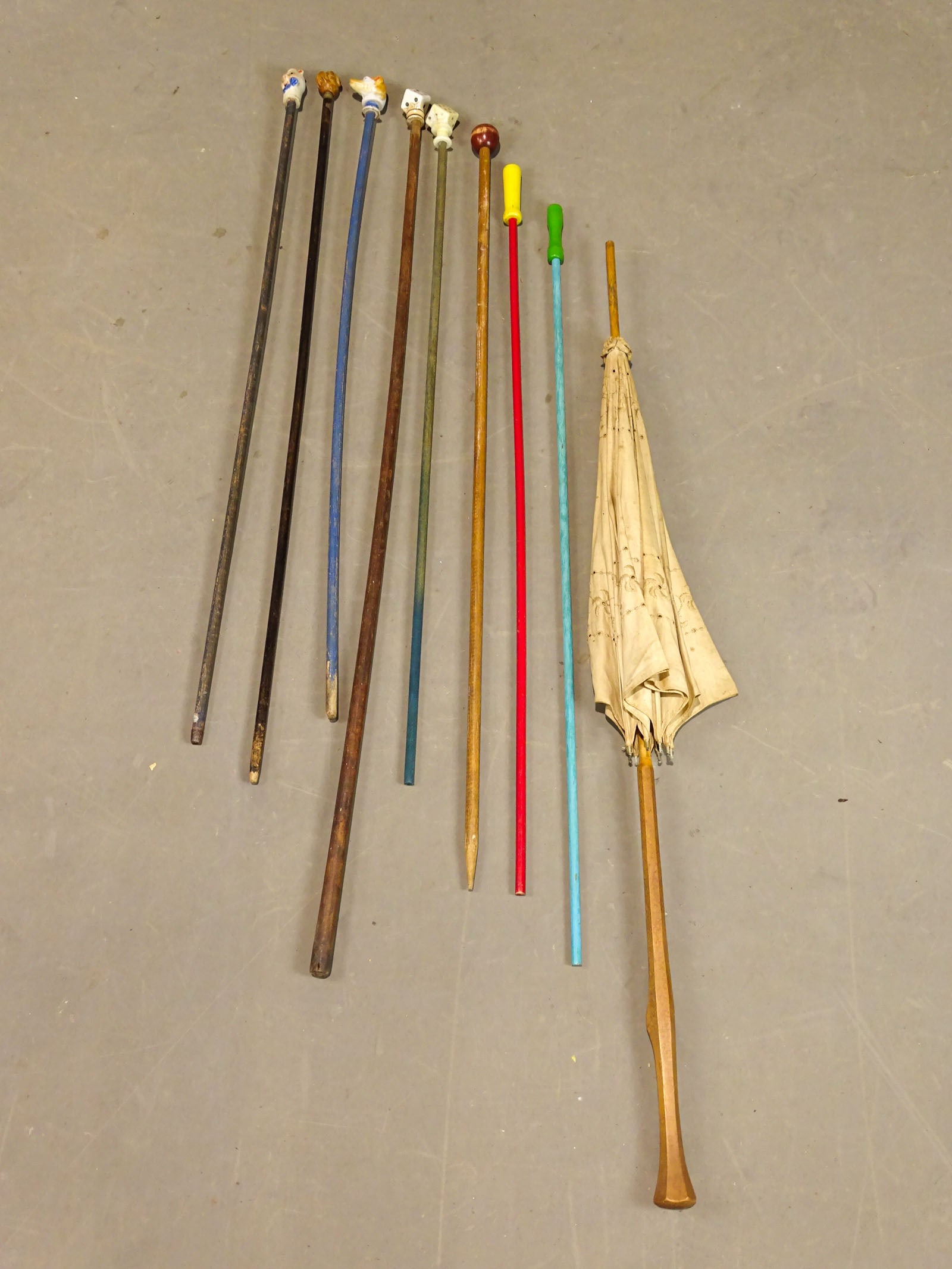 Walking Sticks Lot: Lot of (8) Walking Sticks and umbrella.