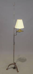 Wrought Iron Floor Lamp: Wrought iron and brass tri-foot floor lamp. 63 1/2" Ht..
