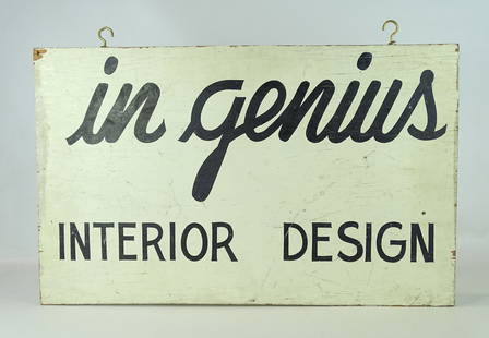 Trade Sign: Painted wooden double sided trade sign "in genius INTERIOR DESIGN". 18" x 29". Provenance; Booma Antiques, St. Augustine, Florida