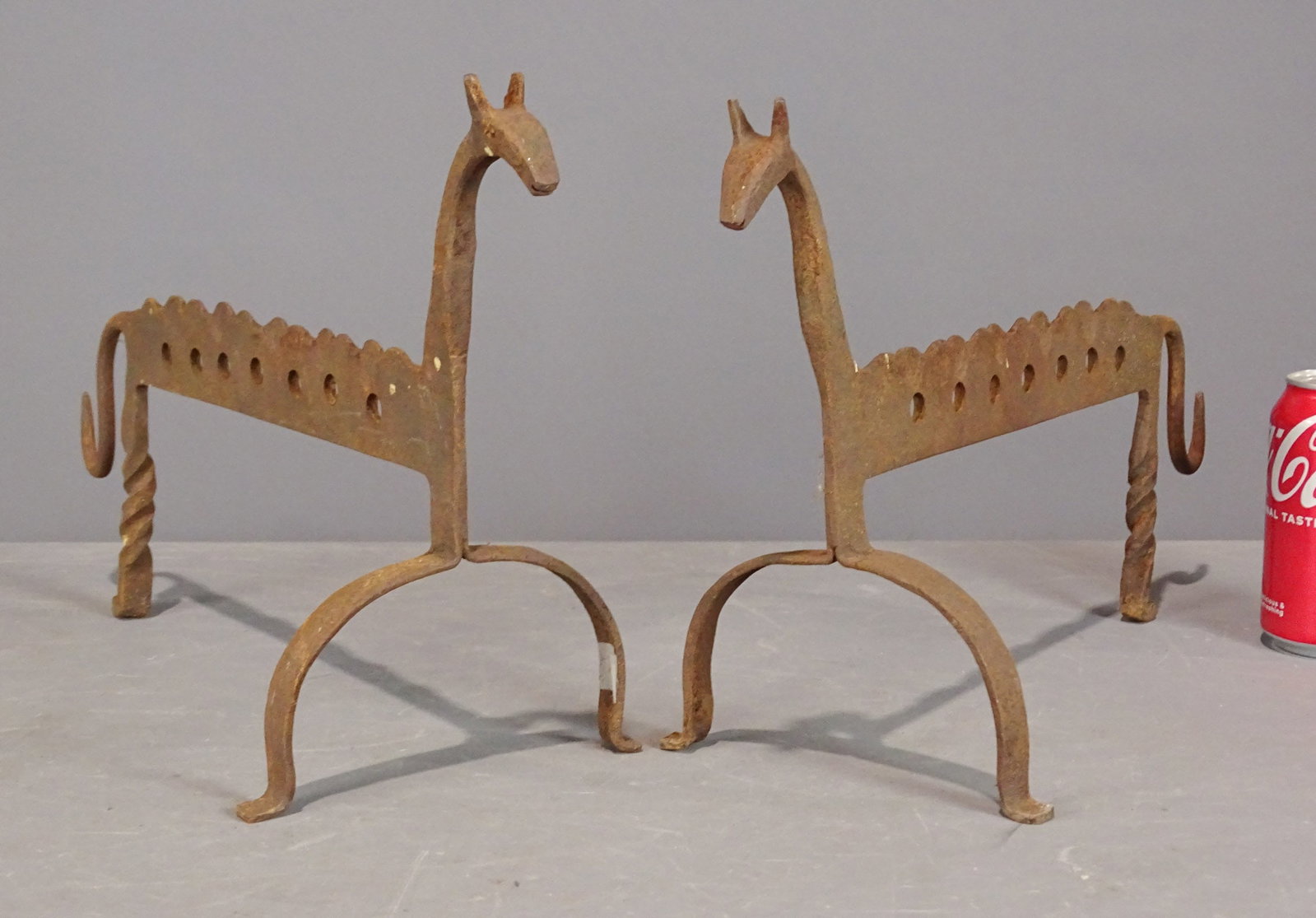 Fire Dogs: Pair of iron Horse Head fire dogs. 11" Ht., 16" L..