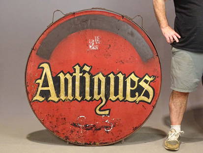 Antique Shop Sign: Early wooden metal framed sign "Antiques". 45" x 41".