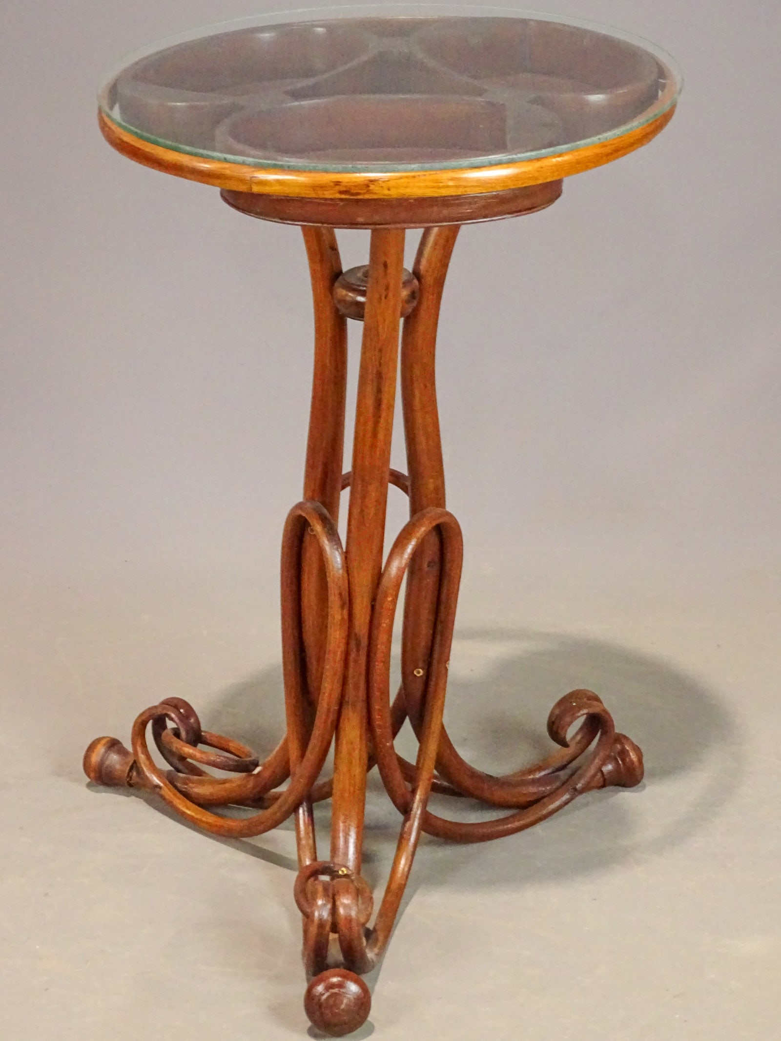 Bentwood Glass Top Table: Bentwood glass top table.19" D., 30 1/2" Ht..