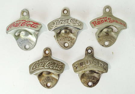 Iron Figural Bottle Openers: Lot (5) iron figural bottle openers including Coca Cola.