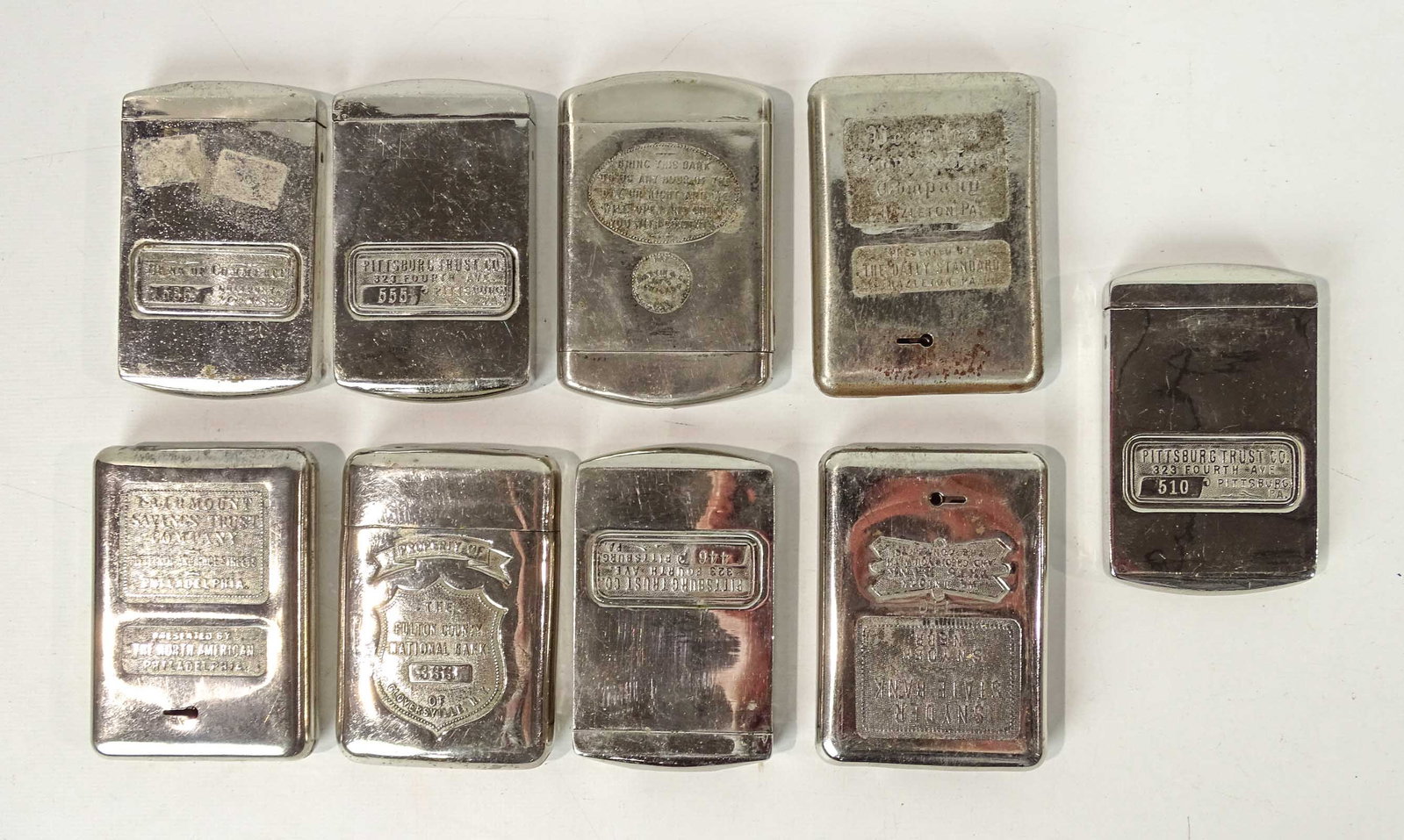 Bank Lot: Lot (9) chrome coin banks.