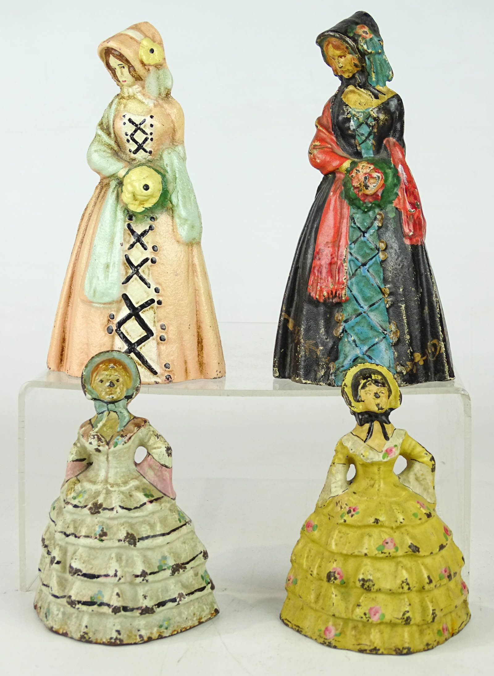 Doorstop Lot: Lot (4) cast iron doorstops including: (2) Little Colonial Lady's (4 1/2" Ht., National Foundry), (2) Little Southern Belle's (6 1/2" Ht., National Foundry).