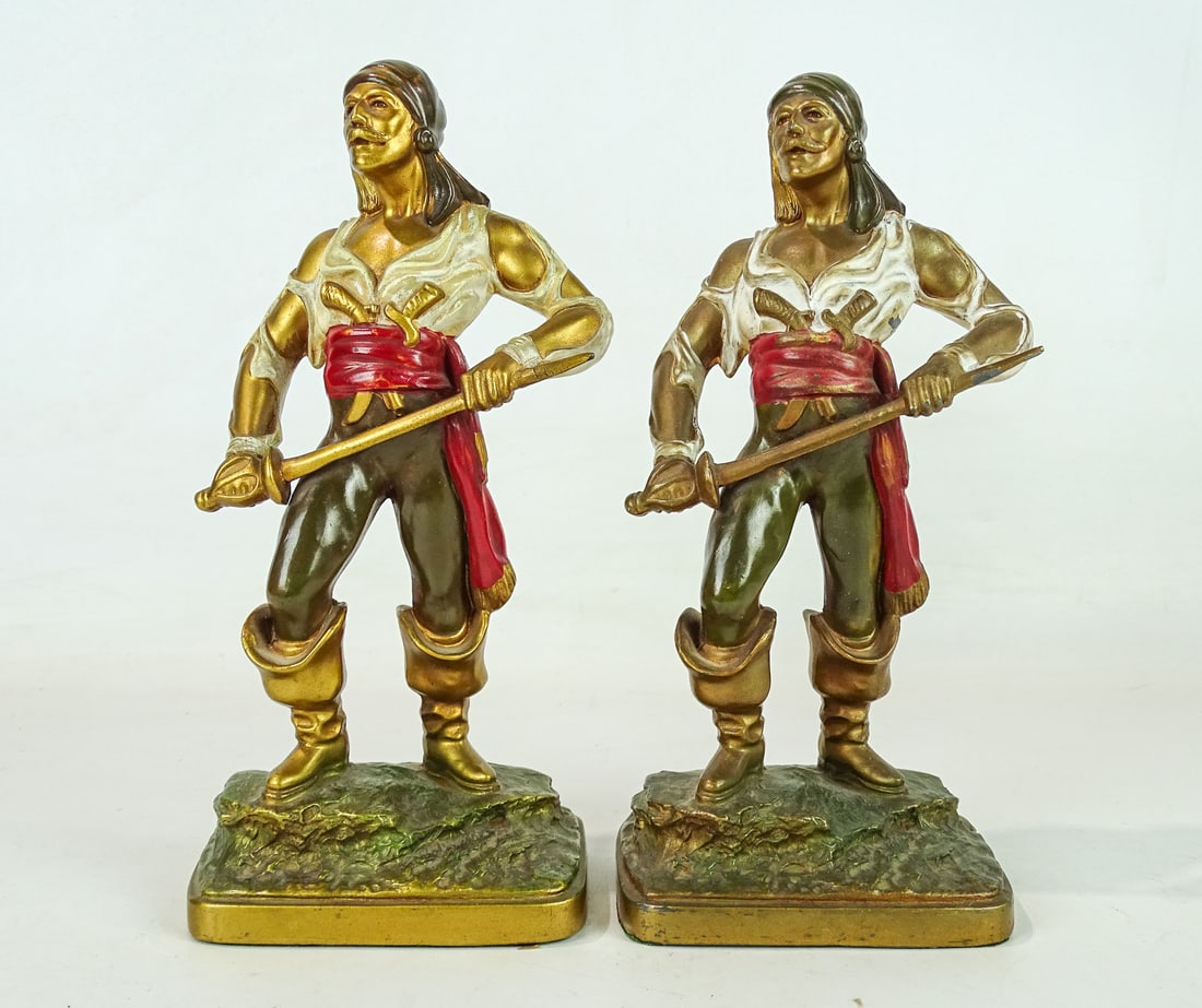 Bookends: Pair of Pirates grey metal bookends. 9 1/2" Ht., 1932, Mfg. K & O.