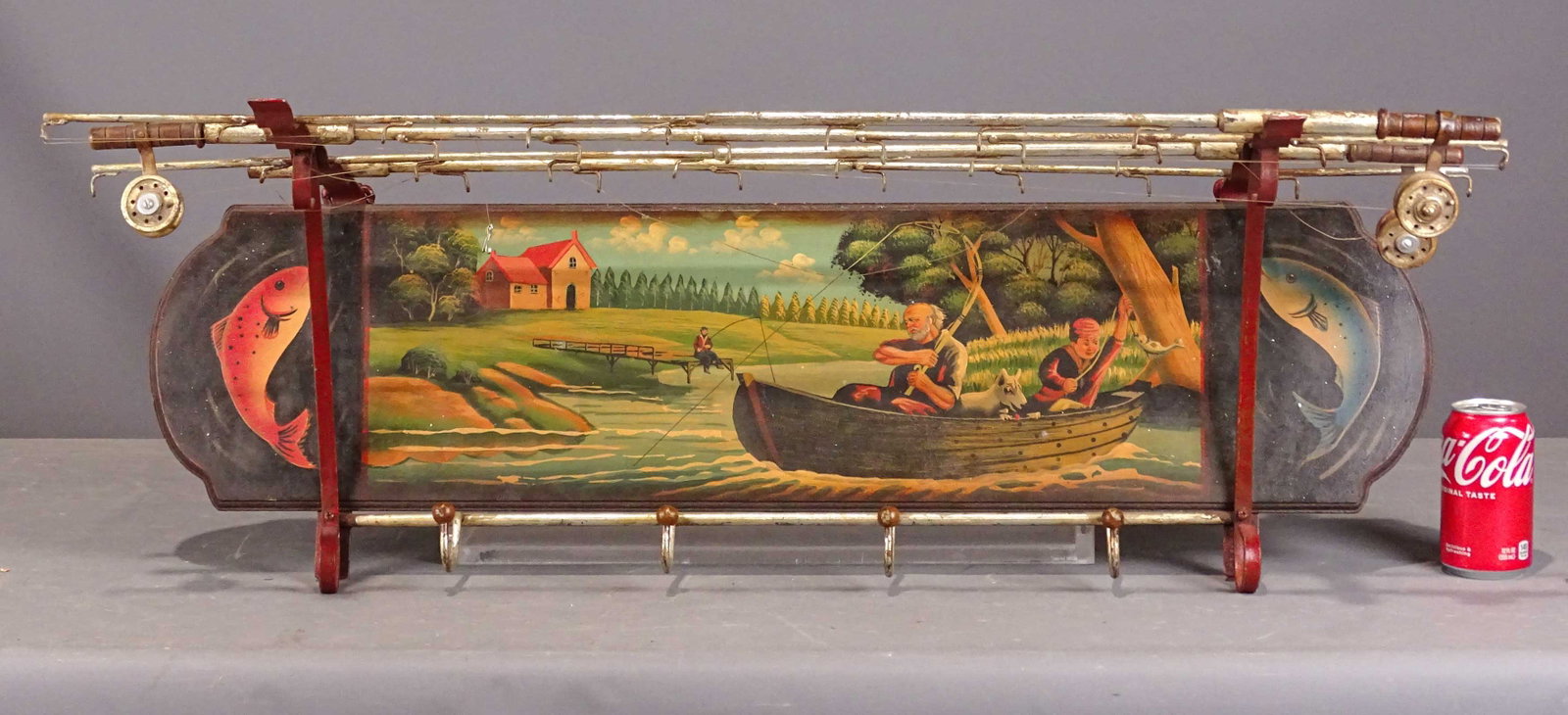 Fishing Motif Wall Shelf: Fishing motif painted wall shelf with poles. 38" L..